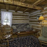 Gustave's 1887 Lodge Living Room & Stairs. Courtesy of Annie Miller, Website, https:www.gustavesgetaway.com.
