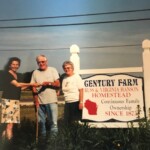 Russell and Virginia Hanson Handing Keys to the Liberty Grove Historical Society's President Marylin Banzhaf, 1993. Courtesy of LGHS.